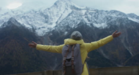 Woman-Admiring-Mountain-View