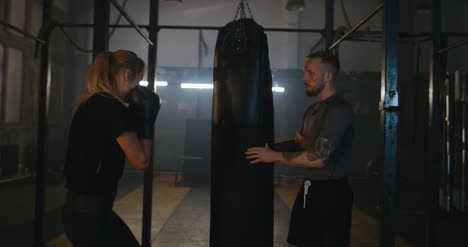 Man-and-Woman-in-Boxing-Gym