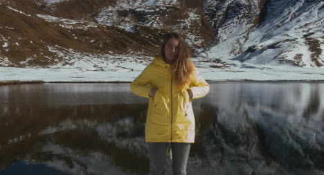 Woman-in-Front-of-Snowy-Lake-02
