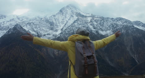 Hiker-in-Mountains-Stretching-Arms