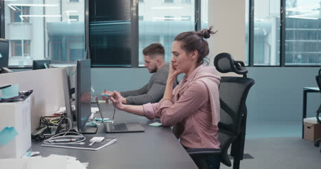 Woman-on-Phone-in-Office