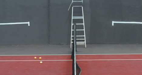 Tennis-Man-Jumps-Over-Net