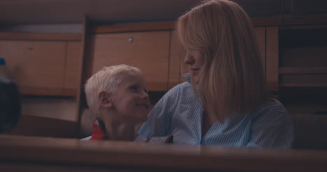 Mother-and-Son-in-Yacht-Cabin-02