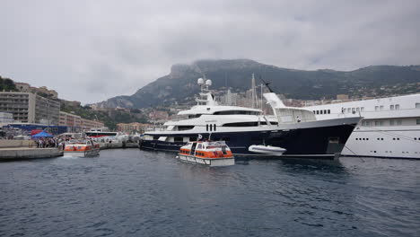 Monaco-Harbor-Tender-Passes-Yachts