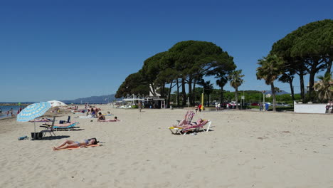 Spain-Cambrils-View-Of-Sunbathers-On-Beach