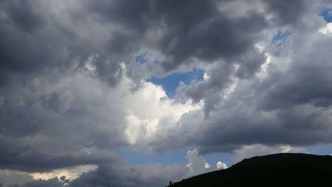 Spain-Pyrenees-Cloud-And-Flock-Of-Birds