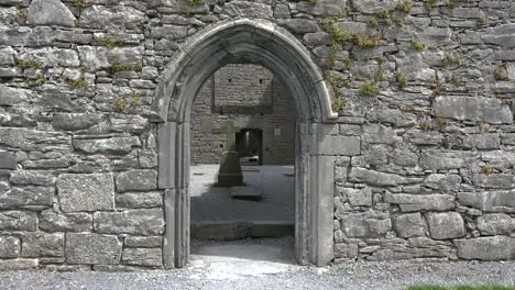 Ireland-Corcomroe-Abbey-With-Gothic-Arch-And-Cross-