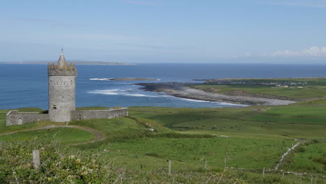 Ireland-County-Clare-Doonagore-Castle-And-Coastal-View