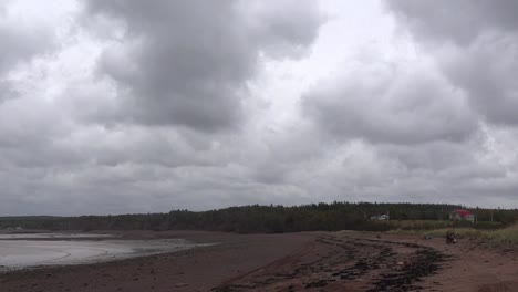 Canada-Bay-Of-Fundy-Beach-And-Cloudy-Sky-Time-Lapse-Pan