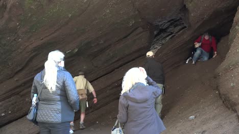 Canada-Tourists-In-A-Sea-Cave-At-Hopewell-Rocks