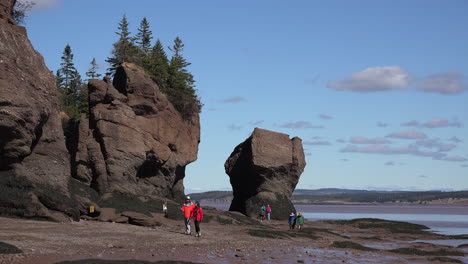 Canada-Tourists-In-Red-Coats-At-Hopewell-Rocks