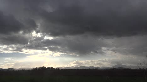 Oregon-Dark-Clouds-And-Birds-Above-Field-Fly-Right