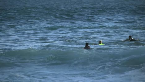 Oahu-Sandy-Beach-Surfers-Wait-For-Waves