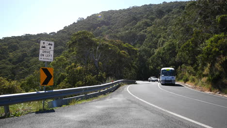 Australia-Great-Ocean-Road-Drive-On-Left-Sign-With-Bus