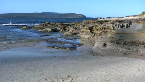 Australia-Murramarang-Rocks,-Waves-And-Sand