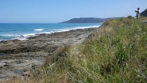 Australia-Great-Ocean-Road-Rocky-Outcrop-And-Photographer