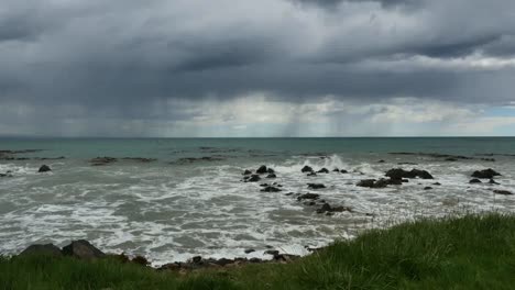 New-Zealand-Kaka-Point-Rain,-Waves-And-Rocks.Mov