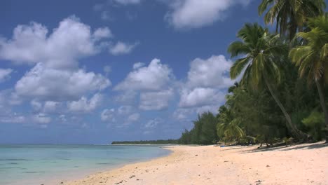 Aitutaki-Beach-Palms-And-Clouds