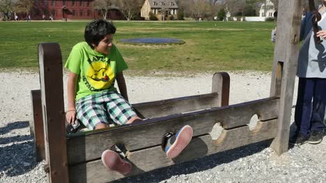 Virginia-Colonial-Williamsburg-Boy-In-Stocks