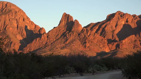 Texas-Big-Bend-Rugged-Mountain-In-Evening-Zoom-Down-Road