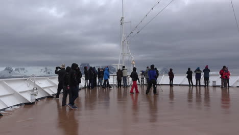 Antarctica-Cruise-Ship-Bow-People-Walking-Across-Zoom-And-Pan