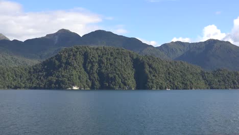 Chile-Aisen-Fjord-Passing-View-With-Small-Boat