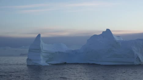 Antarctica-Floating-Iceberg-At-Dawn