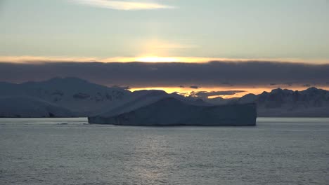 Antarctica-Iceberg-Floating-By-At-Dawn