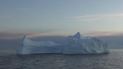 Antarctica-Sunrise-Zooms-To-Iceberg