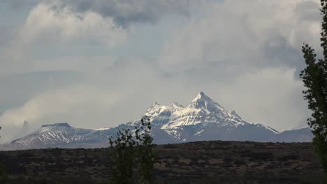 Argentina-Birds-Fly-Past-Mountain-Peak