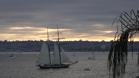 California-San-Diego-Ship-Sailing-At-Sunset