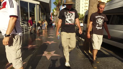 California-Los-Angeles-Hollywood-Walking-Down-The-Sidewalk-Toward-People