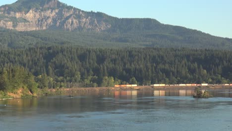 Oregon-Columbia-River-Zooms-On-Train-In-Washington