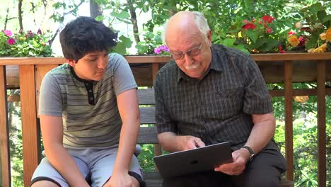 Boy-And-Grandfather-With-Computer