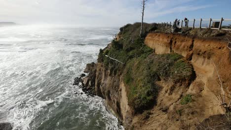 Oregon-Coast-And-Fence-With-People