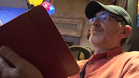 Mexico-Tlaquepaque-Man-With-Hat-Reads-Menu