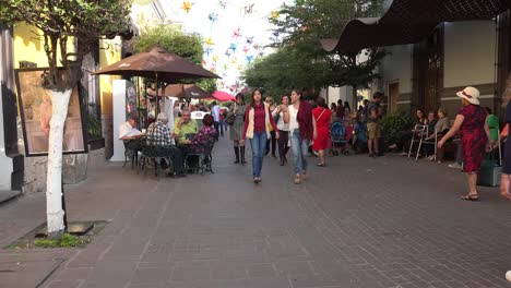 Mexico-Tlaquepaque-Woman-In-Red-Dress-And-Others