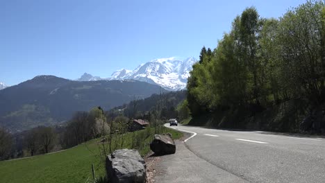 France-Traffic-On-Road-With-Mont-Blanc-In-Distance