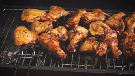 Delicious-chicken-pieces-frying-on-barbecue-grill