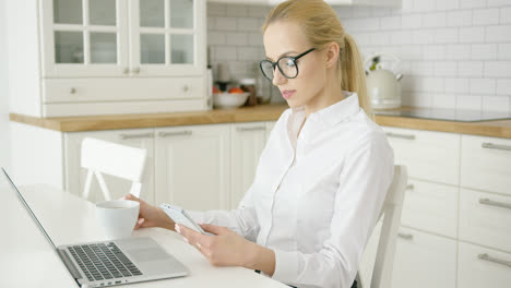 Successful-young-woman-using-devices