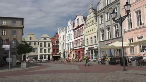 Germany-Wismar-street-scene-with-man-walking