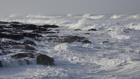 Oregon-detail-of-waves-crashing-on-coast