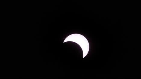 Solar-eclipse-moon-shadow-leaving-sun-time-lapse