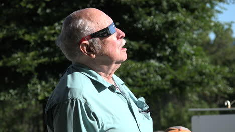 Solar-eclipse-watched-by-elderly-man