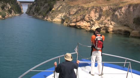 Corinth-canal-with-boat-and-people