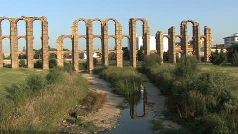 Merida-Aqueduct-of-the-Miracles-reflection-in-stream