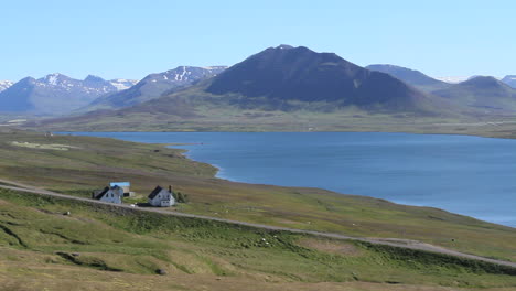 Iceland-Miklavaln-with-fjord-and-houses-c