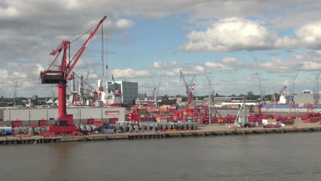 Netherlands-Rotterdam-red-crane-and-containers-on-dock