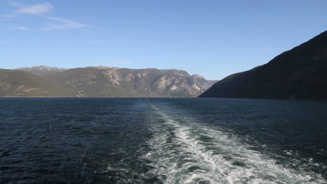 Norway-a-wake-in-Sognefjord-with-mountains-beyond-c