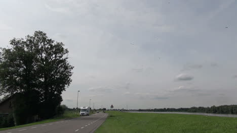 Netherlands-green-shoulder-road-and-slender-canal